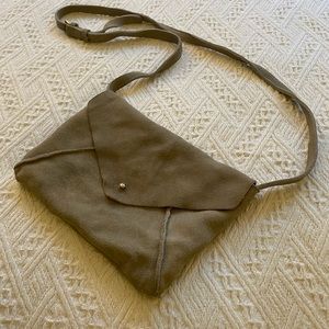 Moda Luxe crossbody. Lipstick stain.